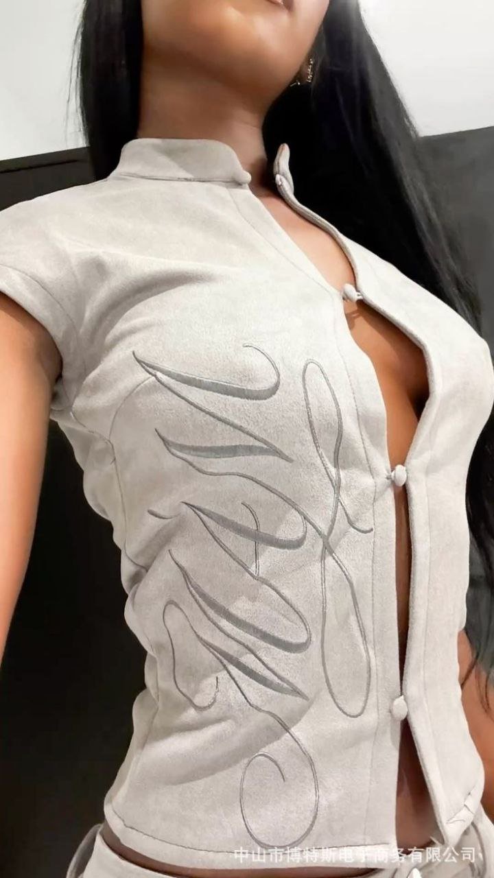 The Embroidered Suede High-Neck Top: Sand Beige Short Sleeve Blouse with Frog Button Detail Copy 3 The Embroidered Suede High-Neck Top: Sand Beige Short Sleeve Blouse with Frog Button Detail Copy