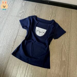 Japanese style slim fit navy blue T-shirt paired with a plaid tiered skirt.