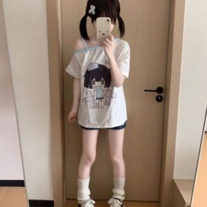 "Japanese Menhera style white T-shirt with off-shoulder blue strap and anime character graphic