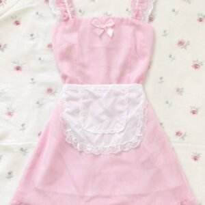 A pastel pink sleeveless dress with ruffled lace straps, a small bow on the chest, and a white lace apron detail, laid flat on a floral rose-patterned background