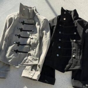 Close-up of metal buttons and traditional knot closures on Neo-Chinese streetwear jacket